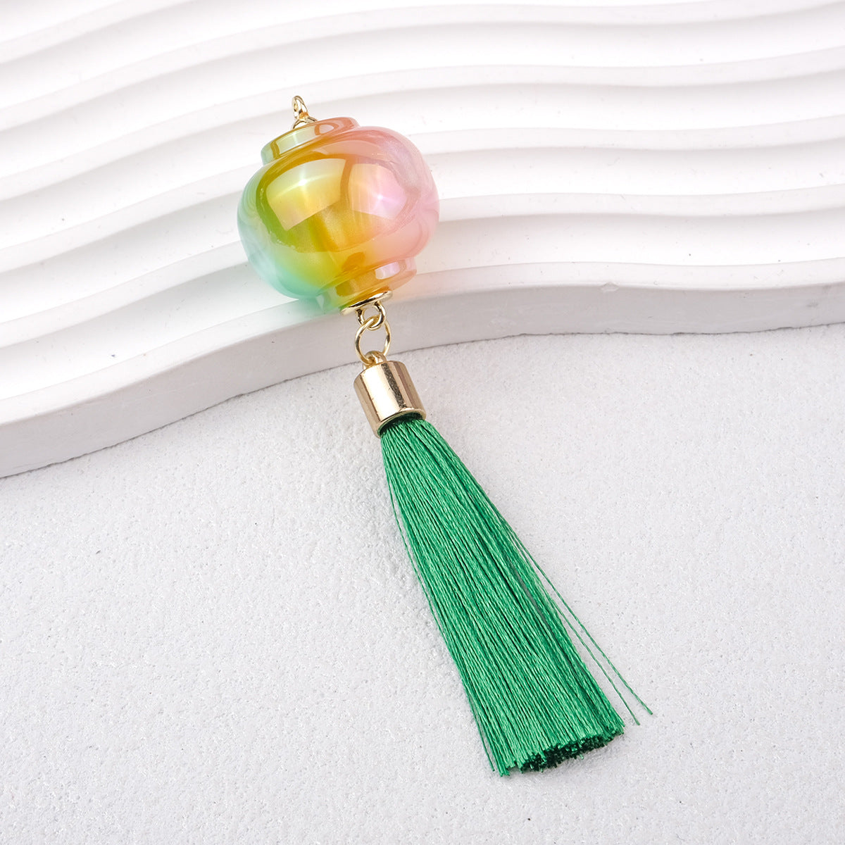 1.9再入荷【T115】提灯カン付きパーツ(キャッツアイ加工レジン、タッセル付き、57*53*25mm)