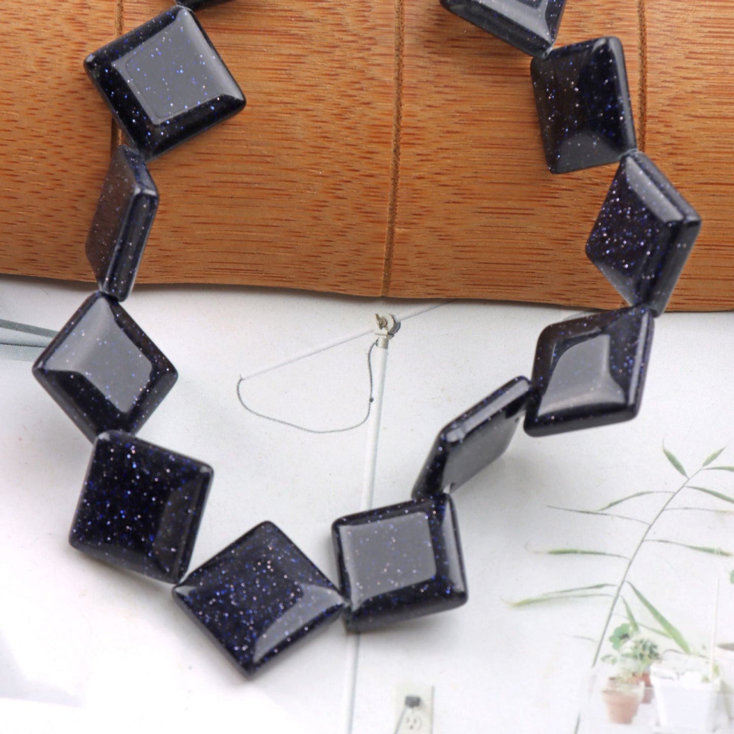 【C089】ブルーサンドストーン(精神安定・直感力UP、斜め穴扁方形、約10mm×10mm)