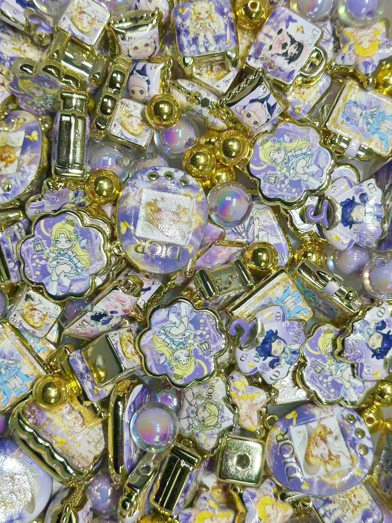 1.5NEW【A413】DIORプリンセス・DORA（ゴールドメッキロゴキャラビーズ13種類と2重アクリルビーズ1色とゴールドメッキビーズ1色）