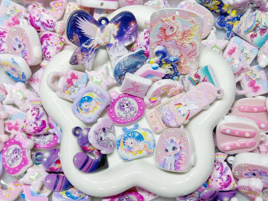 2.27NEW【A467】空へゆくユニコン（浮き彫りプリントビーズ約14種類とプレート1種類とリボンパーツ1種類、普通ビーズなし）