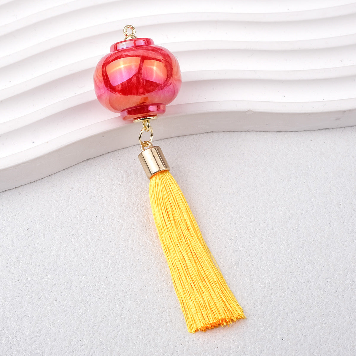 1.9再入荷【T115】提灯カン付きパーツ（キャッツアイ加工レジン、タッセル付き、57*53*25mm）