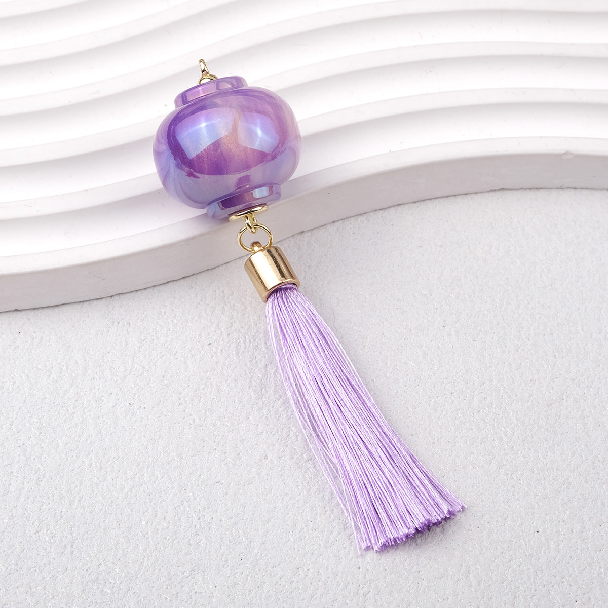 1.9再入荷【T115】提灯カン付きパーツ（キャッツアイ加工レジン、タッセル付き、57*53*25mm）